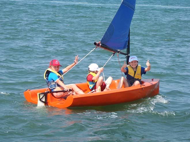 Kids learning to sail in Jim Close's X3 from sailextreme.com © Emma Milne